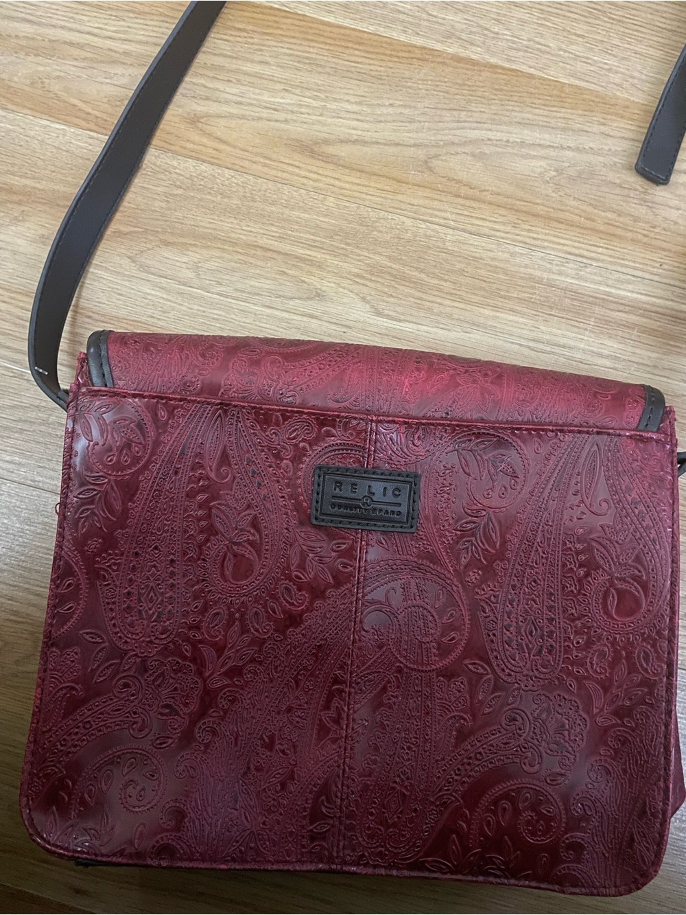 Relic Embossed Paisley Crossbody Bag in Burgundy